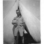 E. R. Knowles the writer of the story outside his tent in the North African desert 4/9/1942