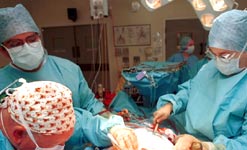 Surgeons perform heart surgery