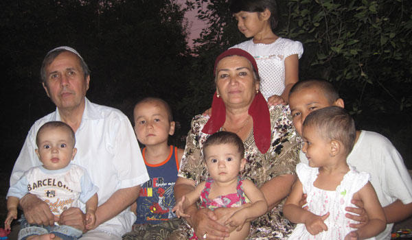 Urunboy Usmanov is reunited with his wife and family