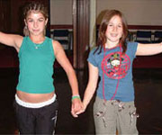 Two young dancer strike a pose