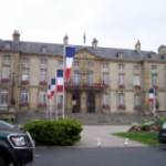Bayeux Town Hall, summer 2004. Bayeux was the first French city liberated in 1944. Many Normandy Veterans hold fond memories of the friendship and welcome they received from the citizens of Bayeux both in 1944 and in subsequent years. Merci beaucoup ("Thank you!")