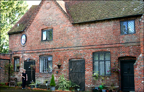 Ann Young outside her house