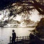 aircraft carrier (in the background) in Sydney Harbour September 1945