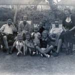 Front row:left to right: David Hillbery, Raymond Masart, John Hillbery, Loline Massart Back row: Alan Lane, Ivy Lane, Daisy Hillbery, Burt Lane, Lilian Massart 252 Lynmouth Avenue, Morden, Surrey, 1942 In front of air raid shelter