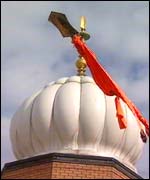 Wrapping the Vaisakhi flag 