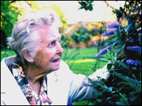 Elderly lady in the garden