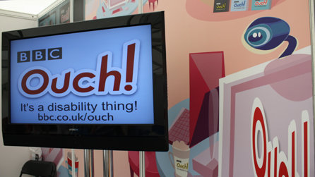 An overview of a very bright and colourful Ouch stand at Beyond Boundaries Live