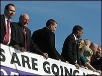 Blades players celebrate on the bus