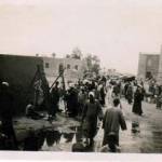 Native market showing butcher’s stall.