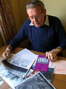 Photograph of a genealogist doing research