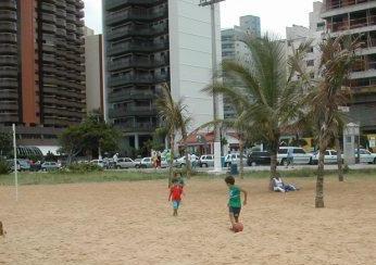 my son playing football in Praia da Costa
