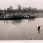 Native boats and a fisherman on one of the waterways.