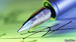 A fountain pen and paper