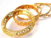 Gold bangles worn by bride