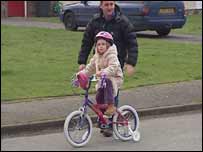 Lydia Cross riding a bike