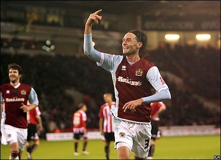 Chris Eagles celebrates scoring for Burnley