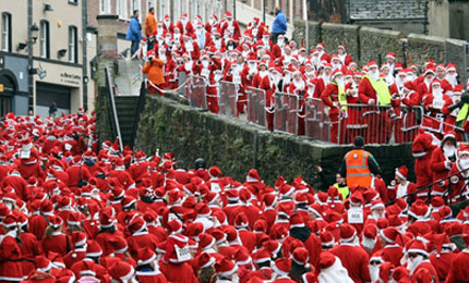 An official total of 12,965 Santas came to Derry