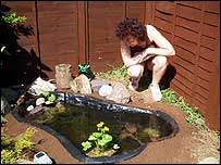 Woman looking at pond
