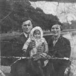 Mr. 'Ron' Staveley, his daughter Patricia and his wife, Rose. A photograph taken on his embarkation leave in 1941. This photograph was kept in his wallet for many years.