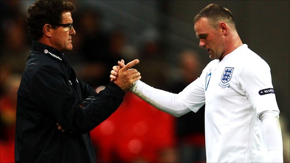 Fabio Capello shakes hands with Wayne Rooney