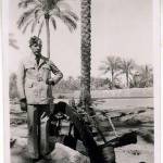 Jack Greenwood in his glamour suit by the irrigation wheel near Khanka
