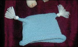 Machine Knit Hat with Tassels