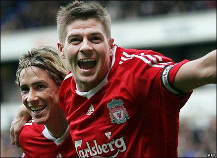 Gerrard celebrates his goal against Bolton