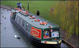 Canal boat on river