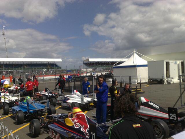 Cars lined up for practice in the paddock at Silverstone