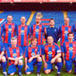 The team, Trevor is second from left on the front row