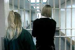 Image: girl and prison warder