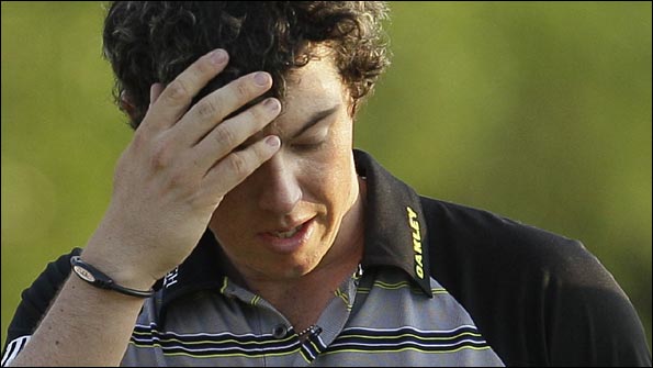 McIlroy still led as he prepared to tee off on the 10th. Photo: AP