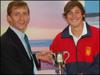 Phil Hudson presents Tom Wherry with the trophy