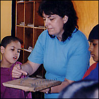 Lesson for boys at 'Juconi House', how to play a zither, 1998
