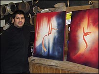 Ibrahim with some of Mohammed's original work