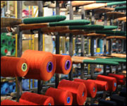 Spools of thread ready for the looms.