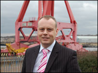Mike Adie in front of the Swan Hunter cranes