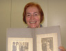 Madeleine Purswani showing photographs of her parents, Richard Newman and Robertina Lillian Dann, on their wedding day