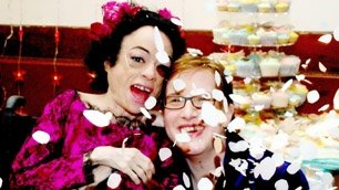 Liz and partner Jo showered in confetti