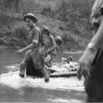 Towing Than Shwe on a lilo down the river Chaunggyi. May 8th 1942