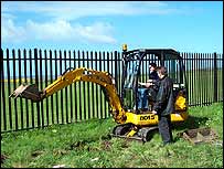 Suzanne learning to use the mini-JCB