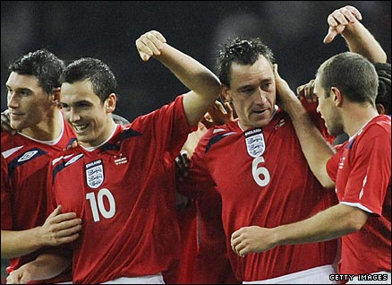 England players celebrate win