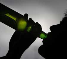 A man drinking alcohol