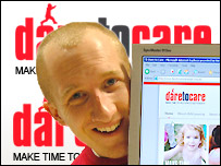Tom Whalley hugging the dare to care webpage