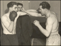 Boxing legend, Dennis Powell (right)