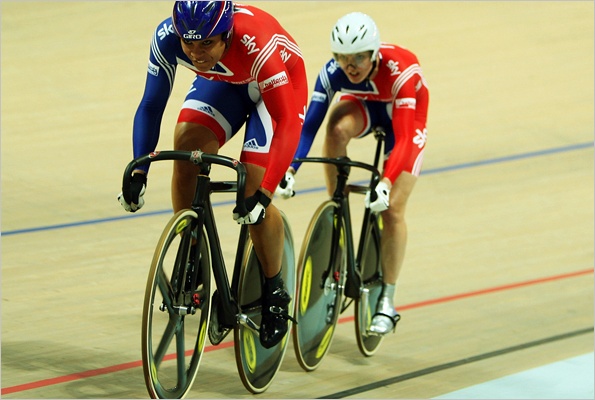 Shanaze Reade and Victoria Pendleton compete on the track