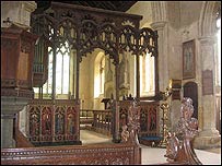 Pew ends and rood screen