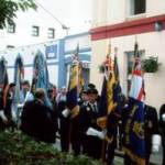 Sunday 26 June 2005: Standard Bearers from Royal British Legion Branches, Veterans and Service Associations waiting to take part in the official County of Cumbria 'Victory Parade' at Whitehaven, Cumbria. About 1000 WW2 veterans and 37 Standard Bearers took part. [Photograph by Joseph Ritson].