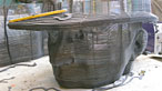 Photograph of the miner's head of the Six Bells sculpture under construction
