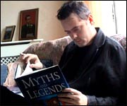 Tobias reading a book